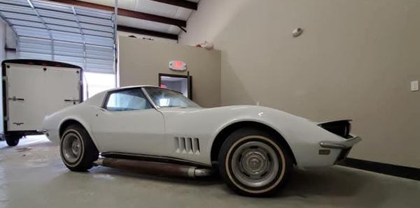 After: classic car, primer to white, repaired