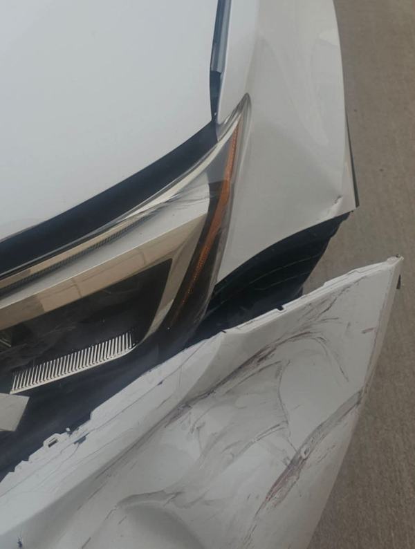 Before: white car front corner
